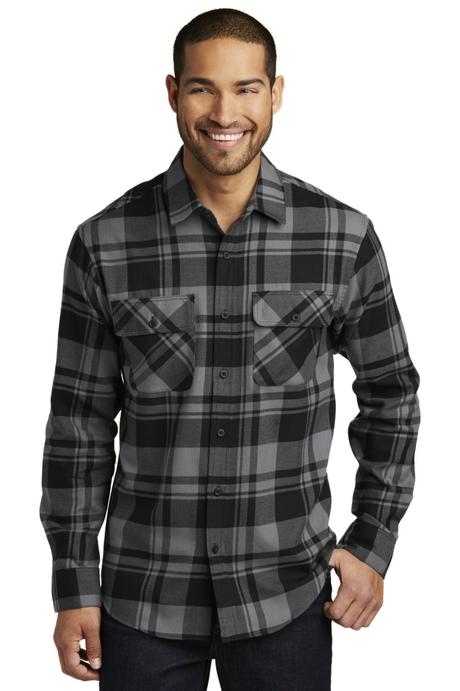 Man with a black and grey flannel