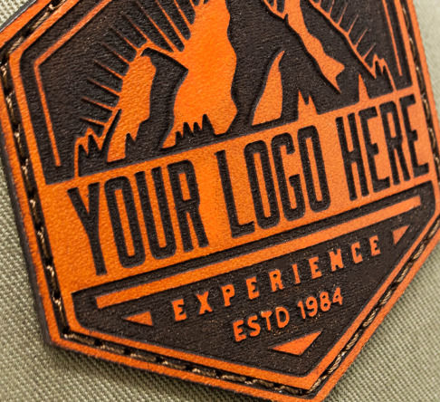 Close up of a tan engraved leather patch